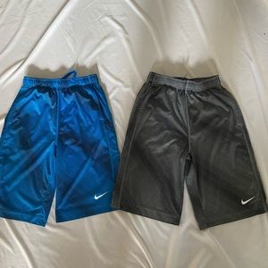 Boys large 2 pair Nike DriFit Shorts. $18  for 2. 1 gray 1 blue